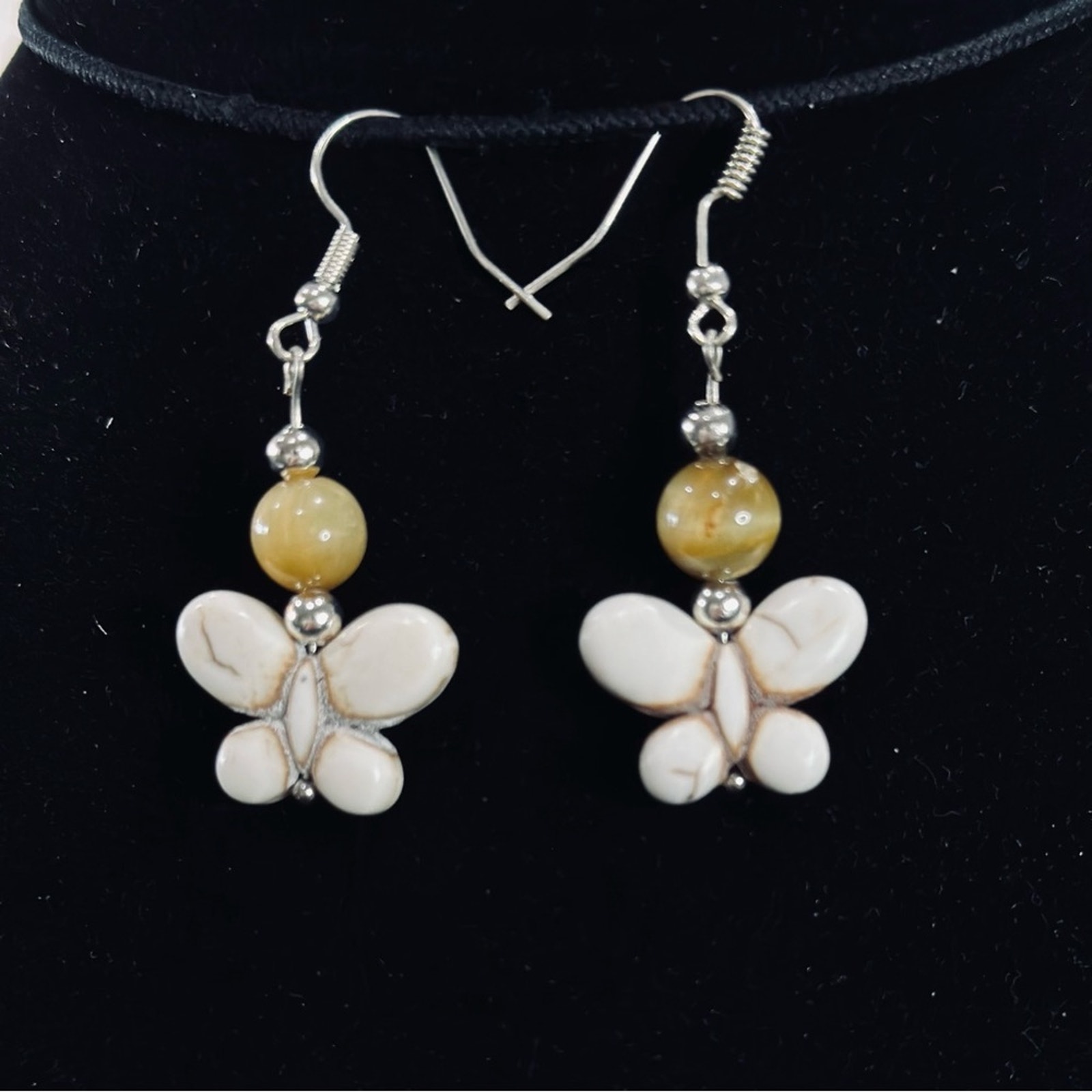 Medium Butterfly Howlite With Yellow Turquoise Bead. Silver Plated Findings.